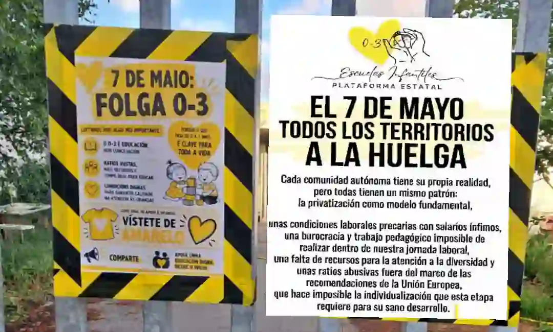 Carteles de huelga colgados en la verja de un centro