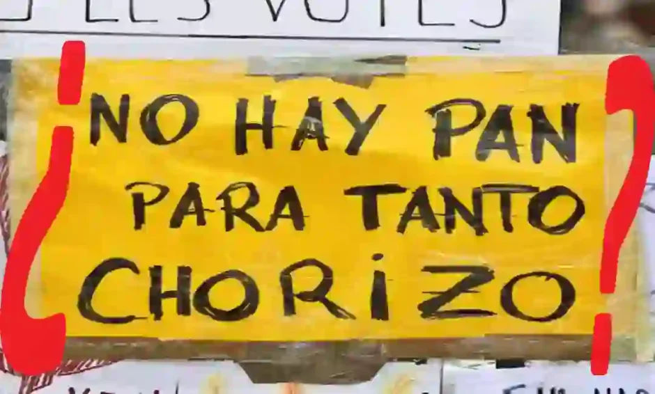 Cartel del 15M con paréntesis añadidos